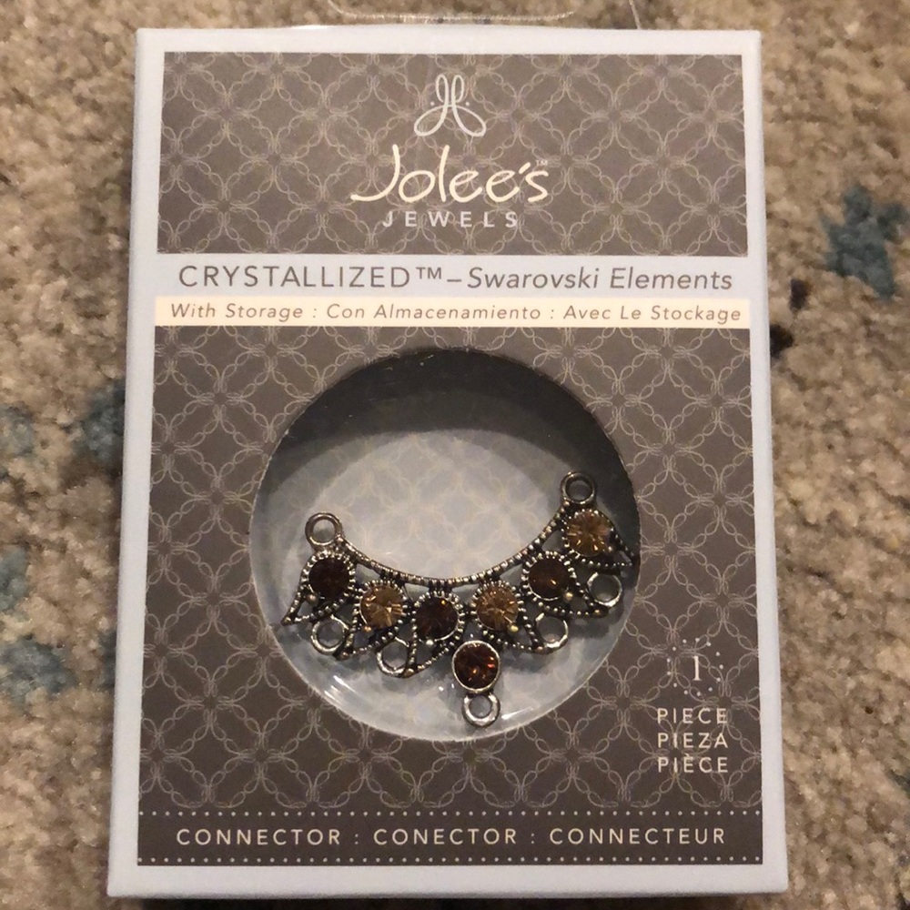 Jolee’s crown style connector red and gold gems set in a gold crown